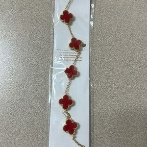 Red clover bracelet.